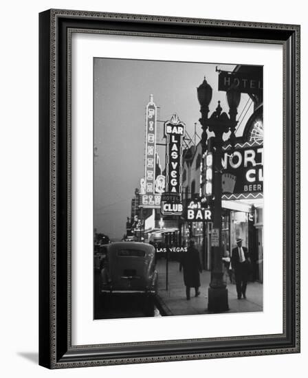 Brightly Lit Casinos Lining the Street-Peter Stackpole-Framed Photographic Print