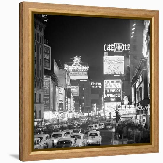 Brightly Lit Signs Shining over Traffic Going Down Broadway Towards Times Square-Andreas Feininger-Framed Premier Image Canvas