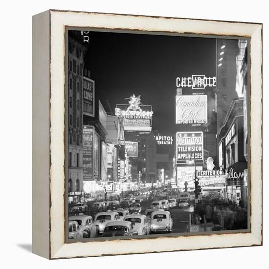 Brightly Lit Signs Shining over Traffic Going Down Broadway Towards Times Square-Andreas Feininger-Framed Premier Image Canvas