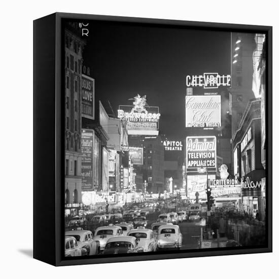 Brightly Lit Signs Shining over Traffic Going Down Broadway Towards Times Square-Andreas Feininger-Framed Premier Image Canvas