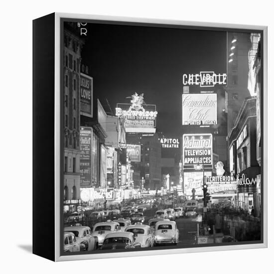 Brightly Lit Signs Shining over Traffic Going Down Broadway Towards Times Square-Andreas Feininger-Framed Premier Image Canvas