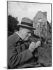 Britain's Prime Minister Winston Churchill Lighting a Cigar-null-Mounted Photographic Print