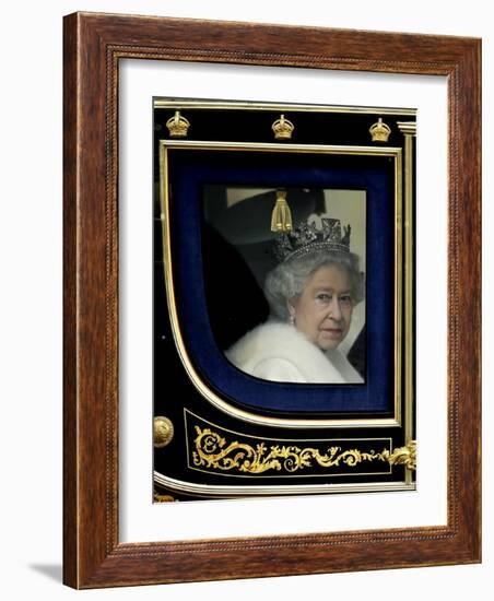 Britain's Queen Elizabeth II Arrives Back at Buckingham Palace in Her State Coach-null-Framed Photographic Print