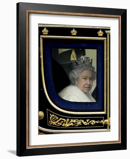 Britain's Queen Elizabeth II Arrives Back at Buckingham Palace in Her State Coach-null-Framed Photographic Print