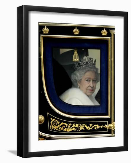 Britain's Queen Elizabeth II Arrives Back at Buckingham Palace in Her State Coach-null-Framed Photographic Print