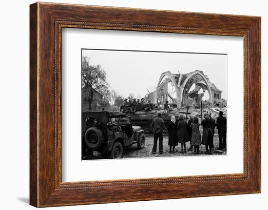 British 49th Armoured Personnel Carrier Regiment Tank Passes Civilians and a Damaged Church-George Silk-Framed Photographic Print