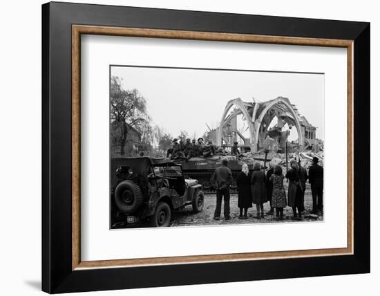 British 49th Armoured Personnel Carrier Regiment Tank Passes Civilians and a Damaged Church-George Silk-Framed Photographic Print