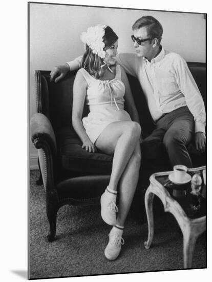 British Actor Michael Caine Talking with an Unknown Woman-null-Mounted Premium Photographic Print