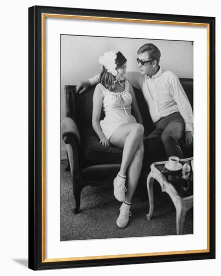 British Actor Michael Caine Talking with an Unknown Woman-null-Framed Premium Photographic Print