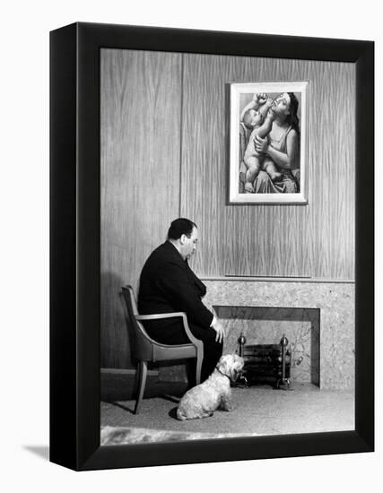 British Born Film Director Posing Beside Fireplace at Home with Pet Sealyham Terrier, Mr. Jenkins-Peter Stackpole-Framed Premier Image Canvas