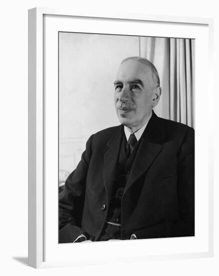 British Economist John Maynard Keynes Sitting in His Study at Home-null-Framed Premium Photographic Print