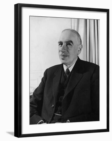 British Economist John Maynard Keynes Sitting in His Study at Home-null-Framed Premium Photographic Print