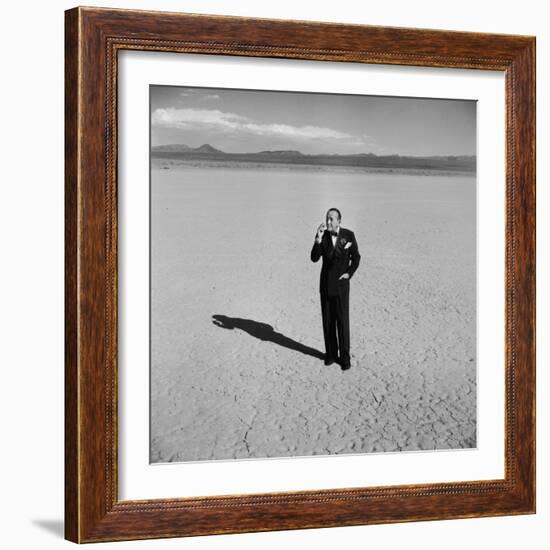 British Entertainer Noel Coward in Middle of Desert, Dressed for His Nightclub Act-Loomis Dean-Framed Premium Photographic Print