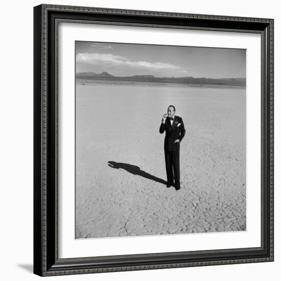 British Entertainer Noel Coward in Middle of Desert, Dressed for His Nightclub Act-Loomis Dean-Framed Premium Photographic Print