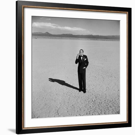 British Entertainer Noel Coward in Middle of Desert, Dressed for His Nightclub Act-Loomis Dean-Framed Premium Photographic Print