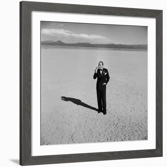 British Entertainer Noel Coward in Middle of Desert, Dressed for His Nightclub Act-Loomis Dean-Framed Premium Photographic Print