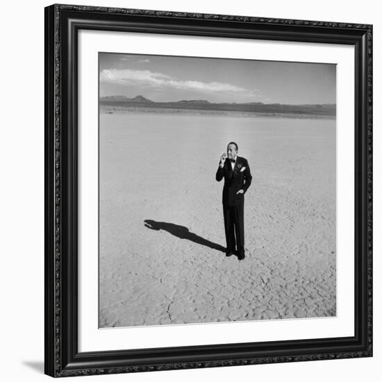 British Entertainer Noel Coward in Middle of Desert, Dressed for His Nightclub Act-Loomis Dean-Framed Premium Photographic Print