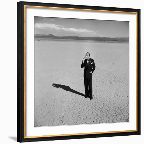 British Entertainer Noel Coward in Middle of Desert, Dressed for His Nightclub Act-Loomis Dean-Framed Premium Photographic Print