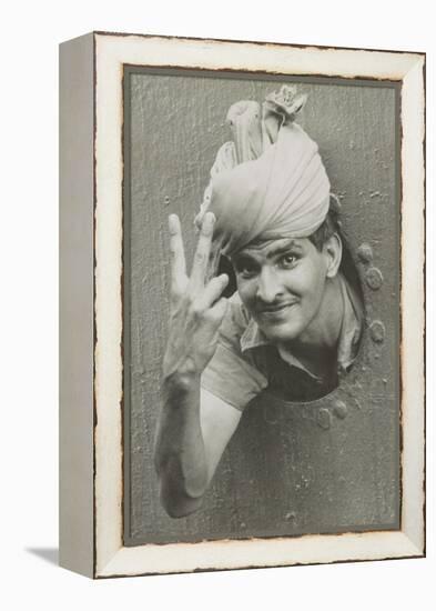 British Indian Soldier He Gives the 'V' Sign from a Port-Hole of a Ship on Arrival in Singapore-null-Framed Stretched Canvas