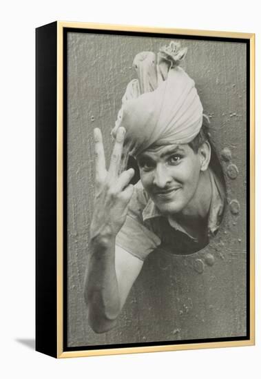 British Indian Soldier He Gives the 'V' Sign from a Port-Hole of a Ship on Arrival in Singapore-null-Framed Stretched Canvas