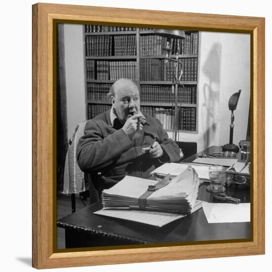 British Leader Winston Churchill Smoking a Cigar at His Desk-Nat Farbman-Framed Premier Image Canvas