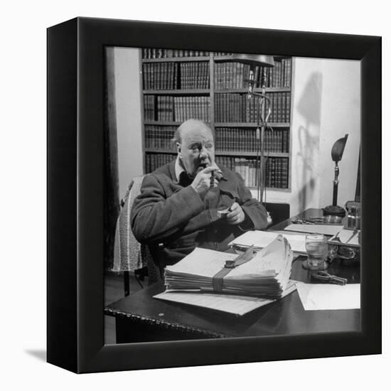 British Leader Winston Churchill Smoking a Cigar at His Desk-Nat Farbman-Framed Premier Image Canvas