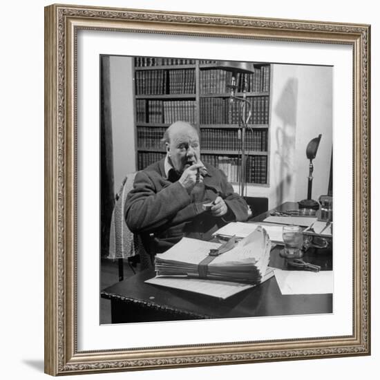 British Leader Winston Churchill Smoking a Cigar at His Desk-Nat Farbman-Framed Premium Photographic Print