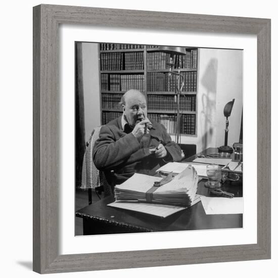 British Leader Winston Churchill Smoking a Cigar at His Desk-Nat Farbman-Framed Premium Photographic Print