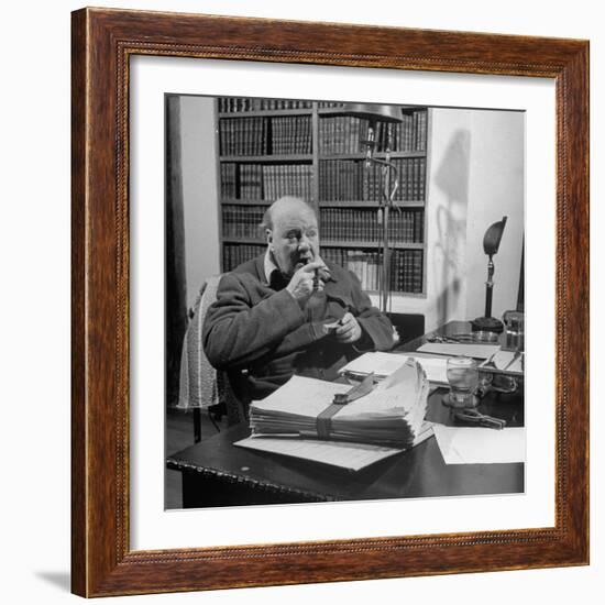 British Leader Winston Churchill Smoking a Cigar at His Desk-Nat Farbman-Framed Premium Photographic Print