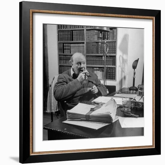 British Leader Winston Churchill Smoking a Cigar at His Desk-Nat Farbman-Framed Premium Photographic Print