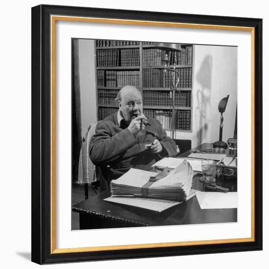 British Leader Winston Churchill Smoking a Cigar at His Desk-Nat Farbman-Framed Premium Photographic Print