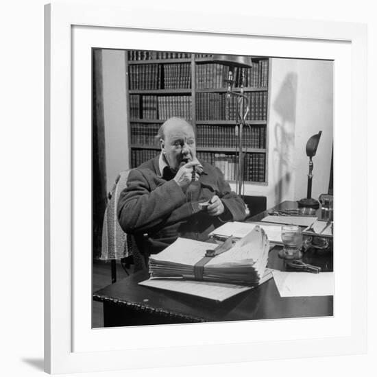 British Leader Winston Churchill Smoking a Cigar at His Desk-Nat Farbman-Framed Premium Photographic Print