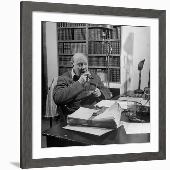 British Leader Winston Churchill Smoking a Cigar at His Desk-Nat Farbman-Framed Premium Photographic Print