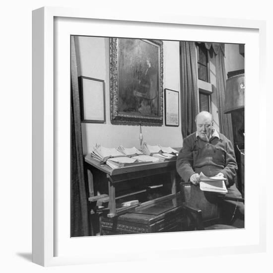 British Leader Winston Churchill Working in His Office, with Painting of Wife Hanging on the Wall-null-Framed Photographic Print