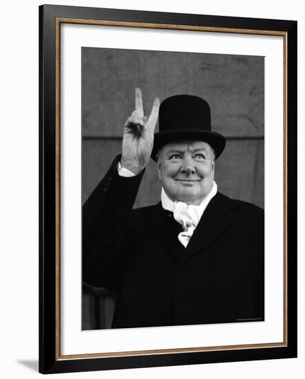 British Pm Winston Churchill Sporting Top Hat with Coat and Scarf as He Holds Up Veed Fingers-Alfred Eisenstaedt-Framed Premium Photographic Print