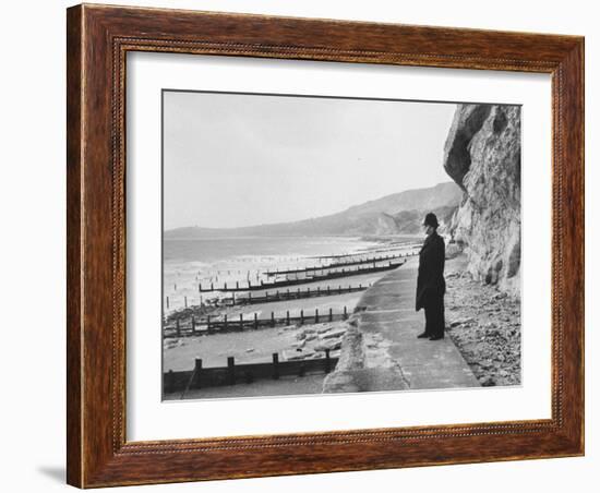 British Police Officer Standing at Foot of Dover Cliffs, Path for Proposed Dover-Calais Tunnel-Ralph Crane-Framed Photographic Print