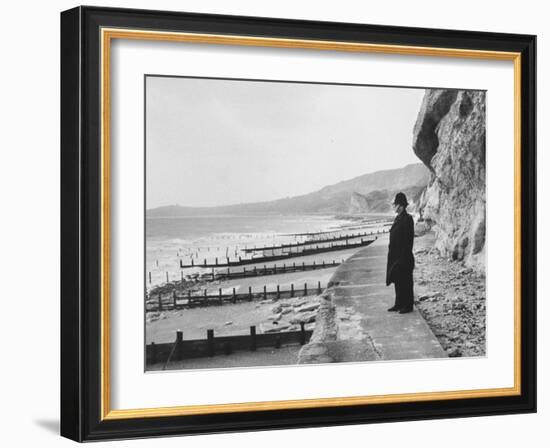 British Police Officer Standing at Foot of Dover Cliffs, Path for Proposed Dover-Calais Tunnel-Ralph Crane-Framed Photographic Print