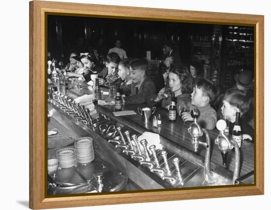 British Refugee Children Eating Ice Cream and Drinking Ginger Ale at a Soda Fountain-John Phillips-Framed Premier Image Canvas