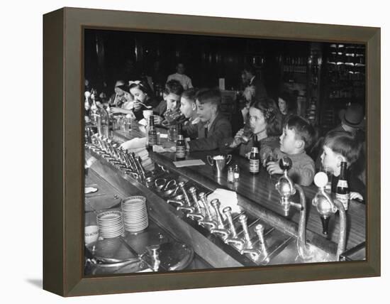 British Refugee Children Eating Ice Cream and Drinking Ginger Ale at a Soda Fountain-John Phillips-Framed Premier Image Canvas