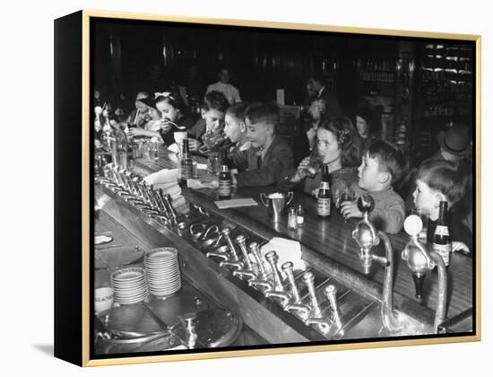 British Refugee Children Eating Ice Cream and Drinking Ginger Ale at a Soda Fountain-John Phillips-Framed Premier Image Canvas