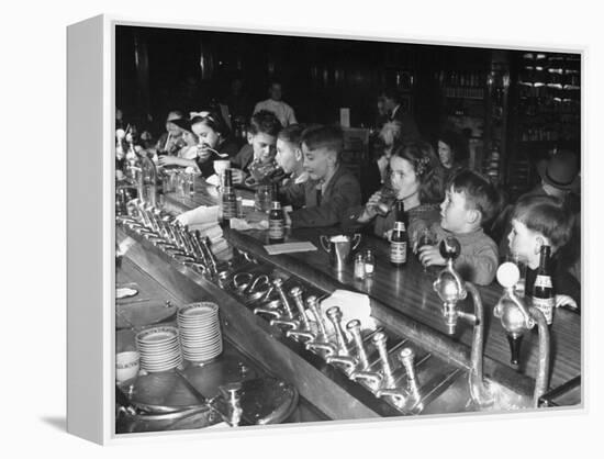 British Refugee Children Eating Ice Cream and Drinking Ginger Ale at a Soda Fountain-John Phillips-Framed Premier Image Canvas