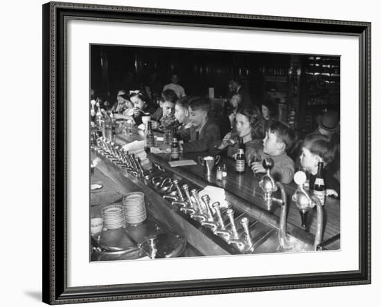 British Refugee Children Eating Ice Cream and Drinking Ginger Ale at a Soda Fountain-John Phillips-Framed Premium Photographic Print