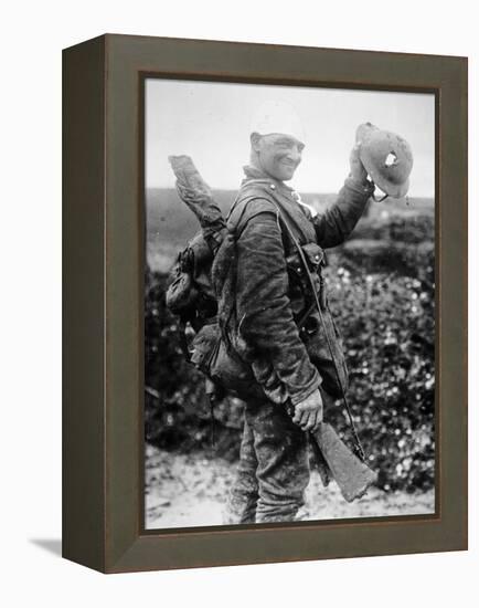 British Soldier with Bandaged Head Shows the Steel Helmet That Saved His Li-English Photographer-Framed Premier Image Canvas