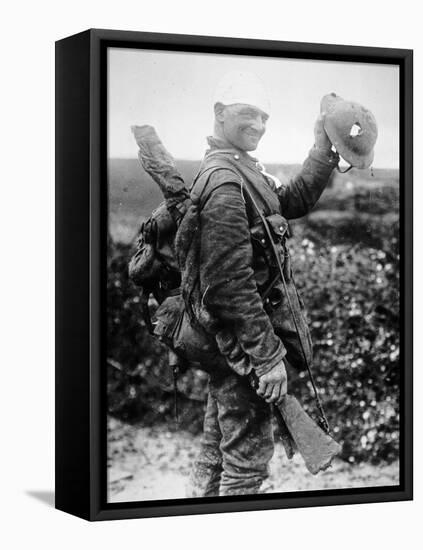 British Soldier with Bandaged Head Shows the Steel Helmet That Saved His Li-English Photographer-Framed Premier Image Canvas