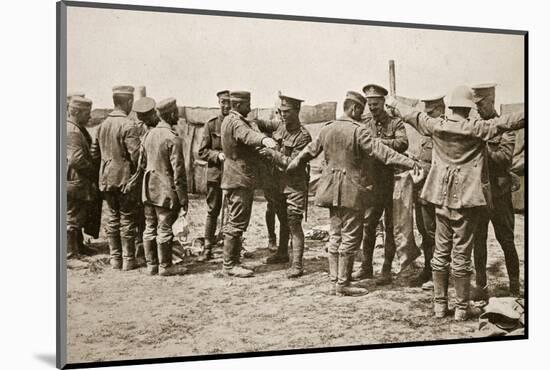 British soldiers searching captured German prisoners, Somme campaign, France, World War I, 1916-Unknown-Mounted Photographic Print