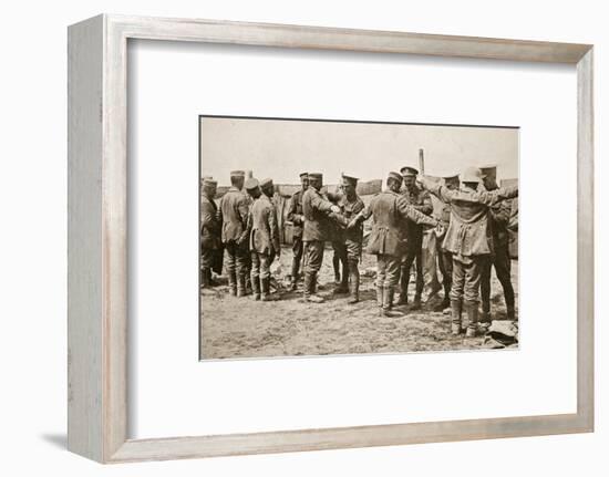 British soldiers searching captured German prisoners, Somme campaign, France, World War I, 1916-Unknown-Framed Photographic Print