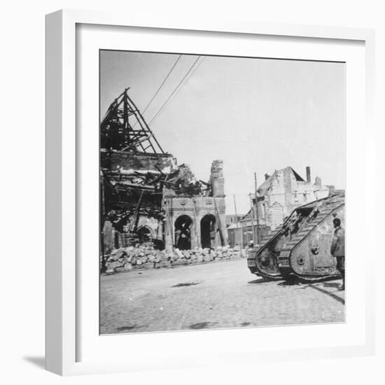 British Tank in Front of Ruined Buildings, Peronne, France, World War I, C1916-C1918-Nightingale & Co-Framed Giclee Print