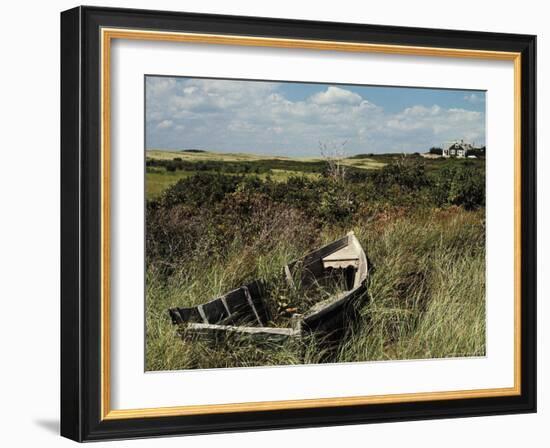 Broken Old Rowboat Cushioned in Tall Wild Grass, with a View of a House in Distance-Alfred Eisenstaedt-Framed Photographic Print