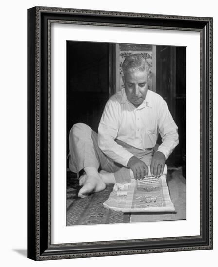 Broker Astrologer Reading Horoscope While Trading at Bombay Stock Exchange-Margaret Bourke-White-Framed Photographic Print