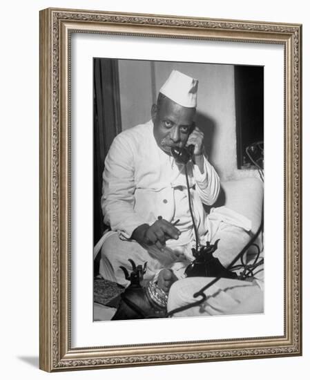 Brokers Speaking on Telephone at Bombay Stock and Cotton Exchanges-Margaret Bourke-White-Framed Photographic Print